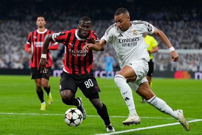 
					Kylian Mbappe saat membela Real Madrid vs Ac Milan.