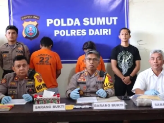 Eben Ezer Sinaga dan  Siska Damai Yanti Pasaribu saat konferensi pers oleh kepolisian (ist)